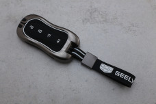 Чохол Geely графіт метал + силікон чорний